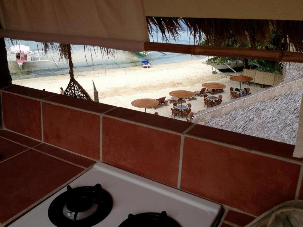 Kokays Maldito Dive Resort Малапаскуа Айлънд Екстериор снимка